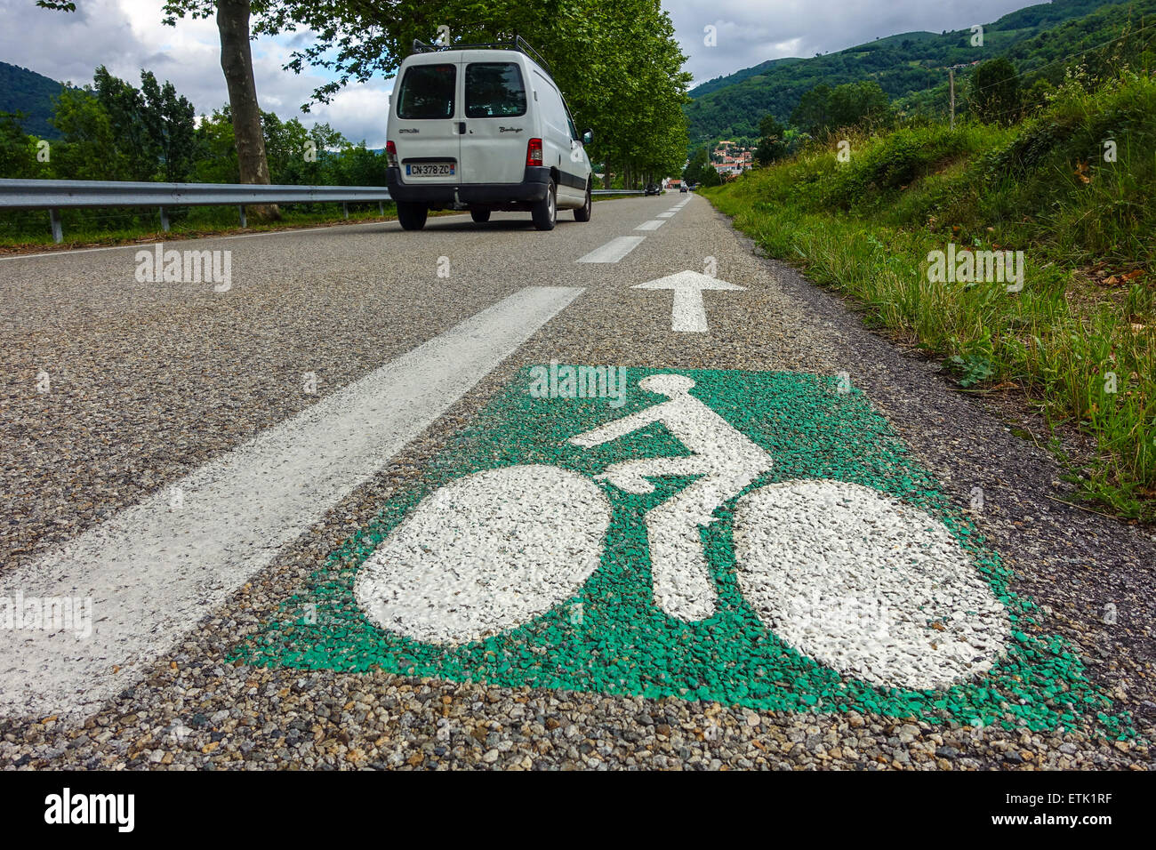 Green and white sign painted on road on cycleway, cycle way cycle-lane, cycle lane France Stock Photo