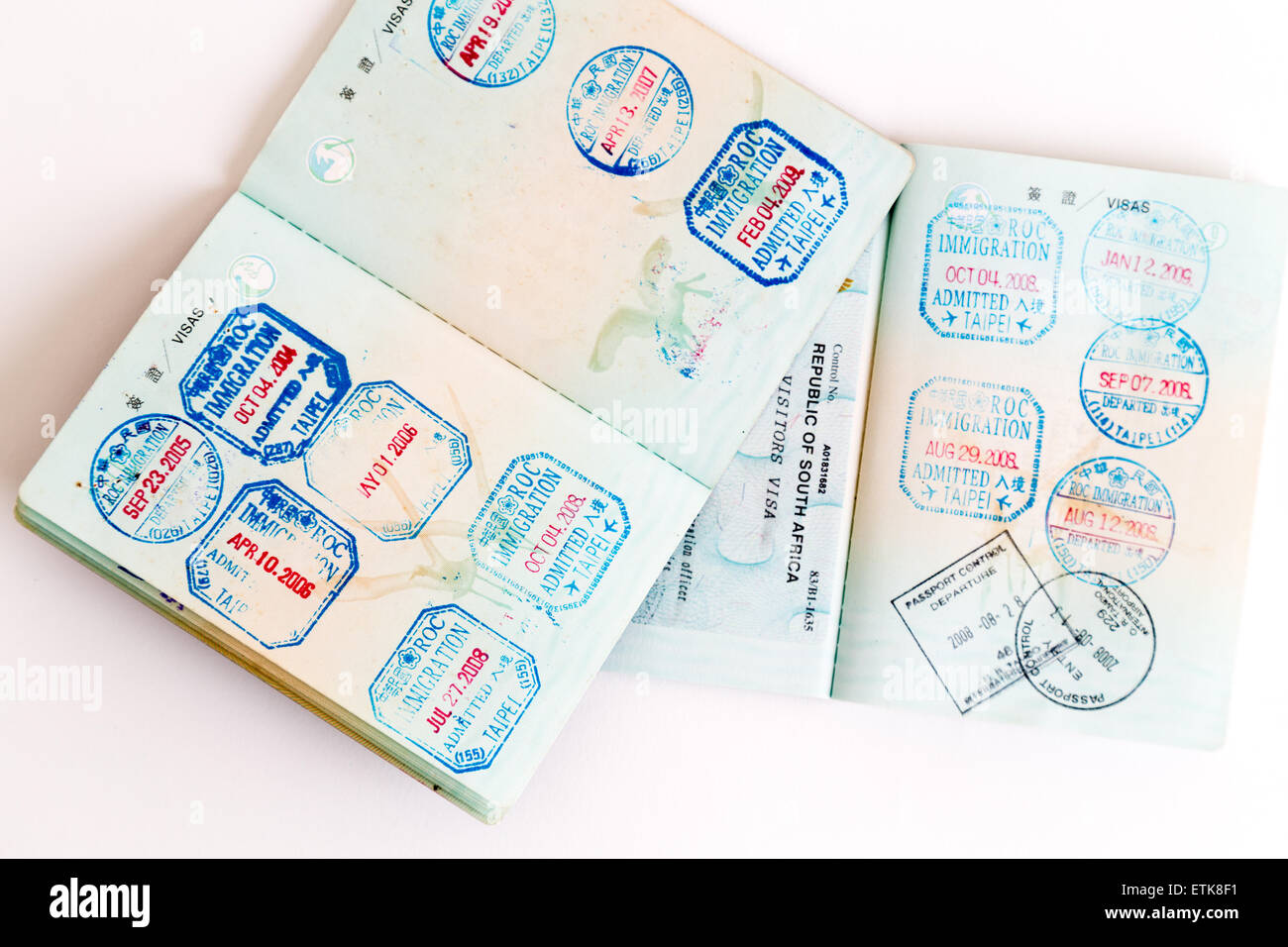 Visa and customs stamps in passports Stock Photo Alamy