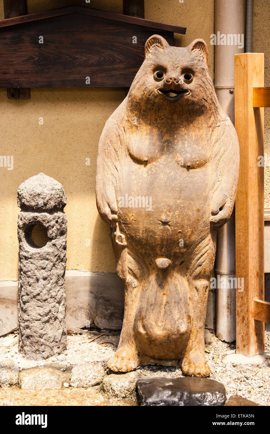 Japan, Kyoto. Tanaki, raccoondog, full size standing statue of the