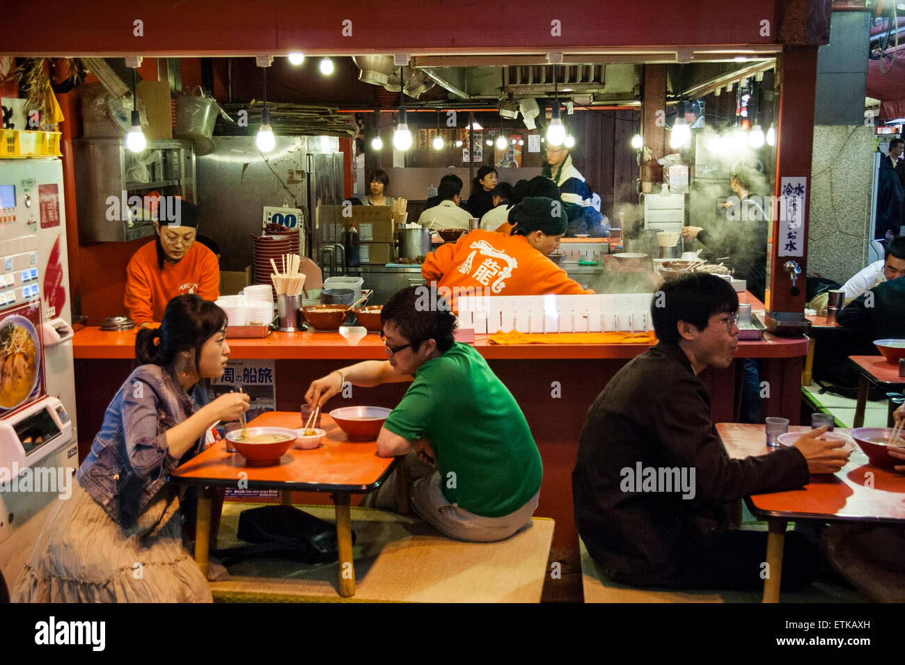 Japan, Osaka, Dotonbori. Kinryu ramen noodle resturant, night, diners