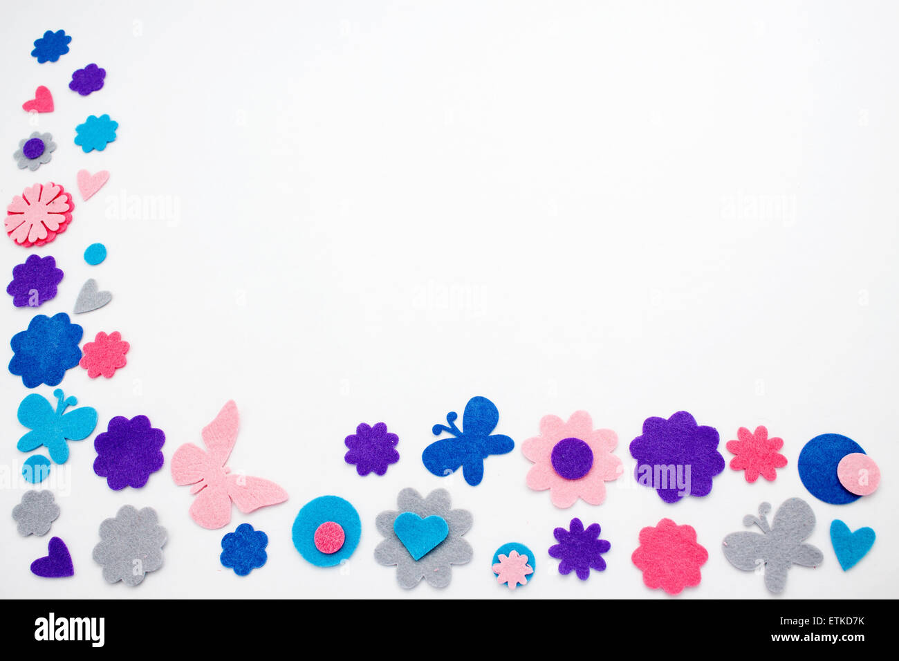 felt embelisments of different colours in an angle shape Stock Photo ...
