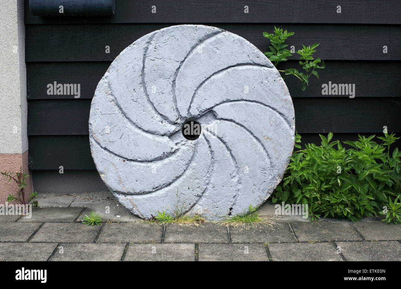 A preserved millstone from a Dutch windmill, Bodegraven, The Netherlands. Stock Photo