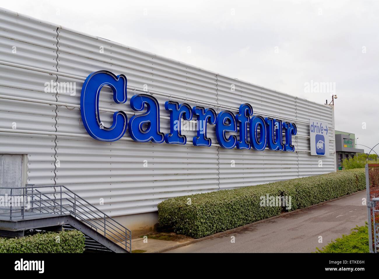 Carrefour logo on store in Citi Europe Calais France Stock Photo