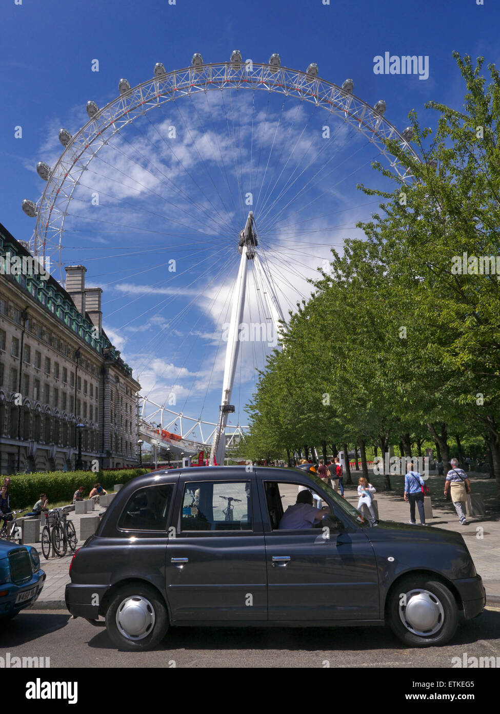 London black cab waiting on cab line, with the London Eye behind South Bank London, England UK Stock Photo