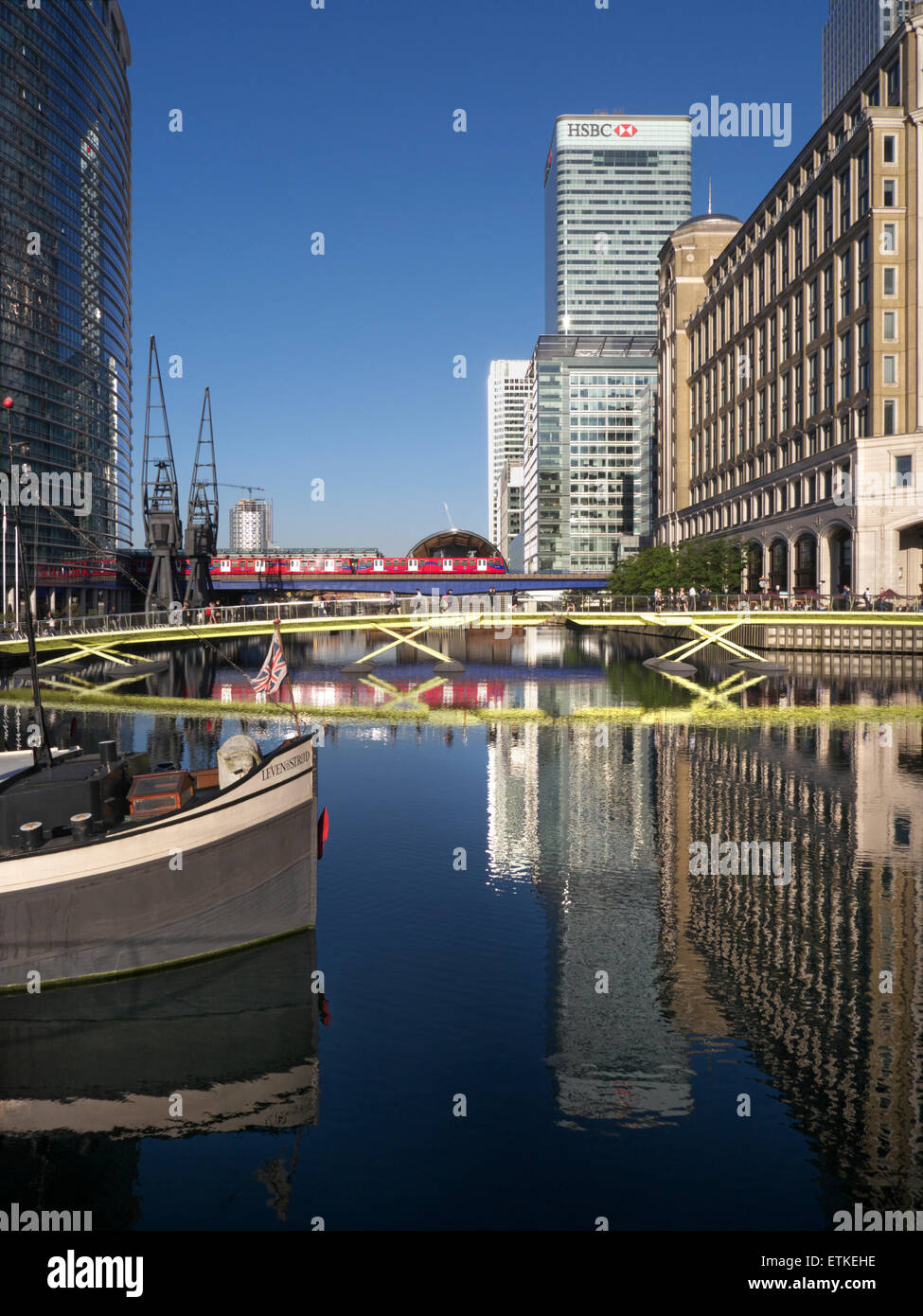 Canary Wharf at North Dock with barge in foreground and HSBC building