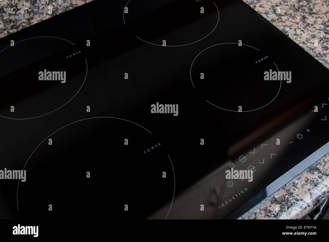 Close up view of an electrical kitchen induction ceramic hob Stock