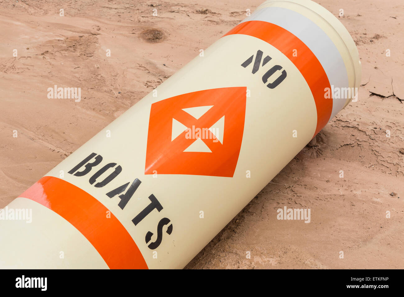 No boats buoy laying on silt mud at drought damaged Lake Mead in Southern Nevada. Stock Photo