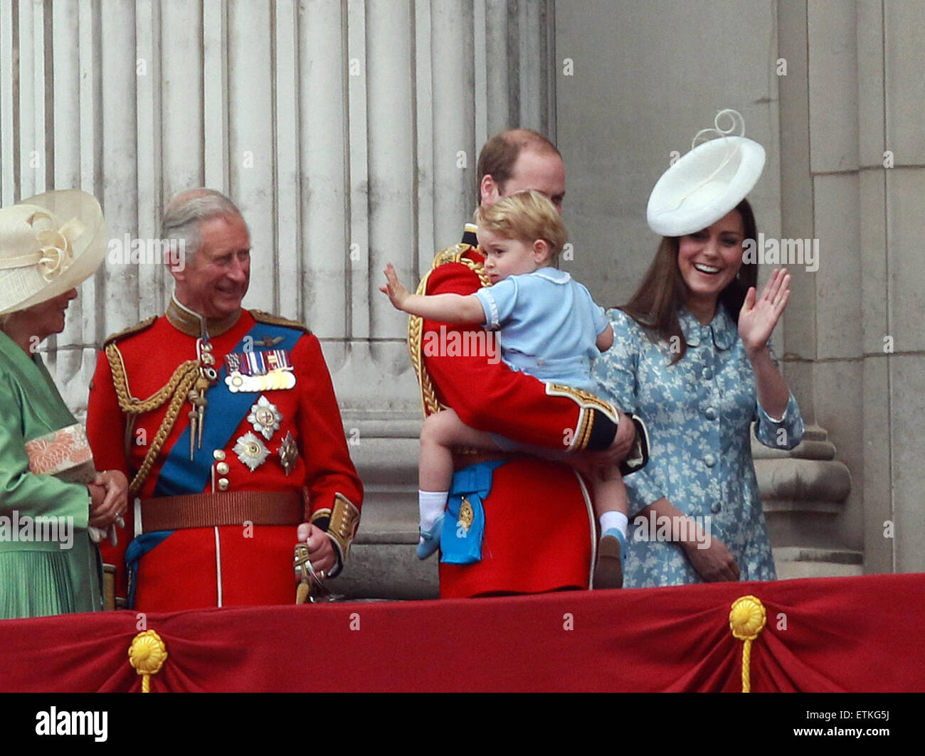 Trooping the Colour . . London, UK . . 13.06.2015 Prince George and Kate (Catherine Middleton) Duchess of Cambridge, wave to the crowd as his father Prince William, Duke of Cambridge, takes him back inside at the Trooping of the Colour 2015. Pic: Paul Marriott Photography Stock Photo