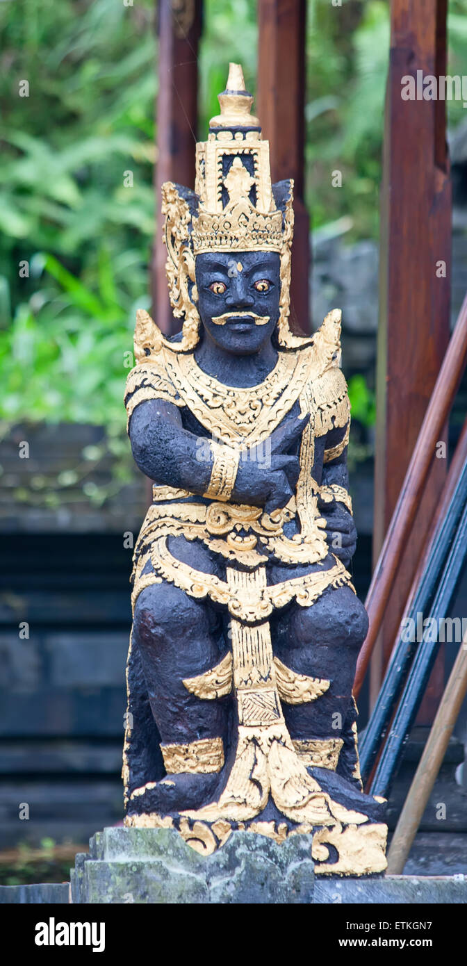 Traditional balinese sculpture near entrance to the temple Stock Photo ...