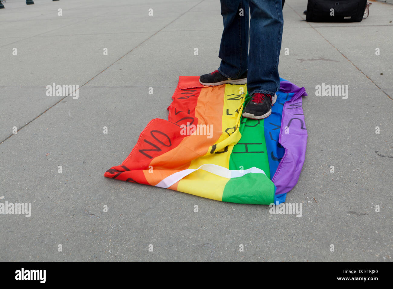 christian-street-preacher-stepping-on-ra