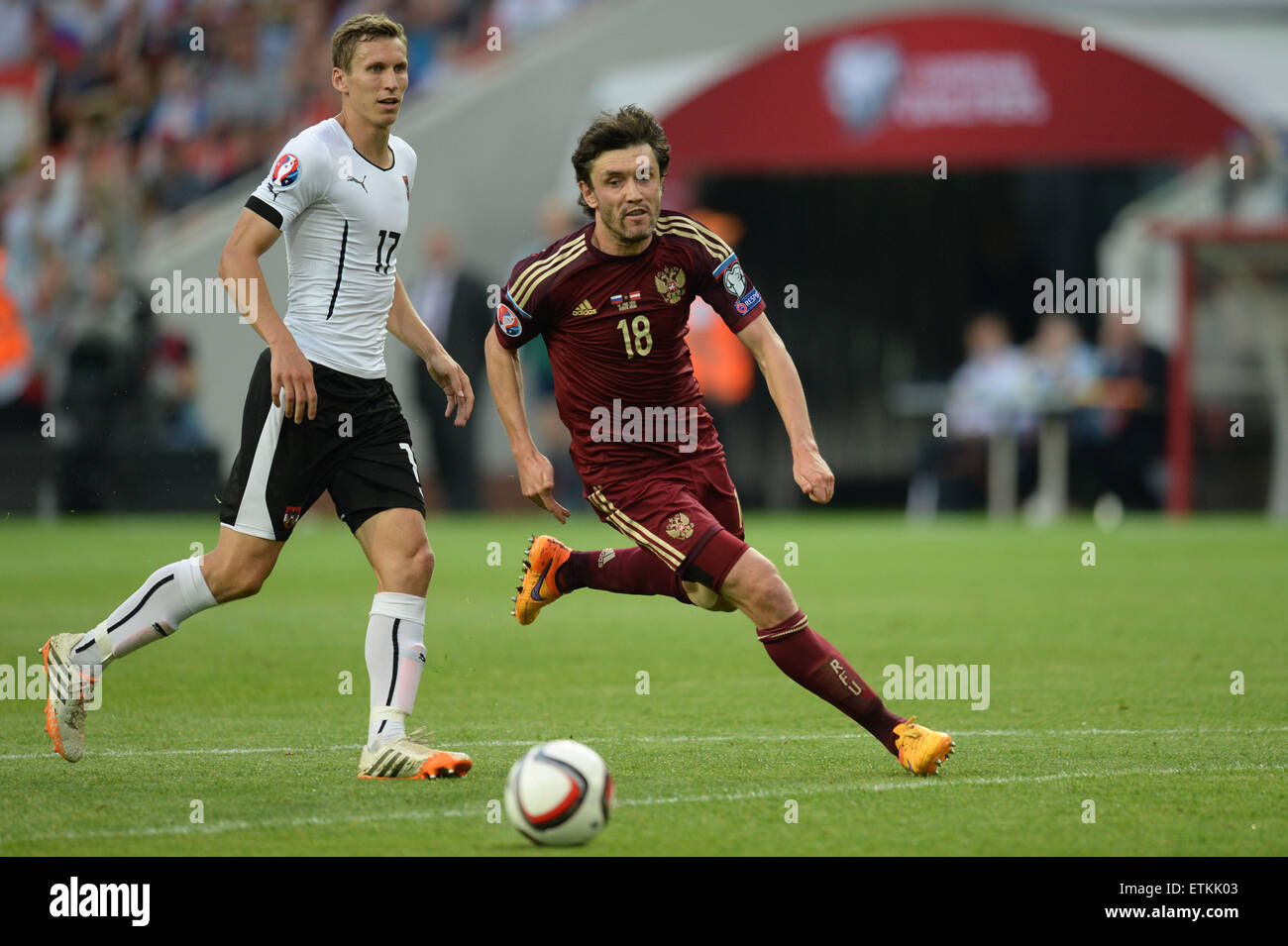 Moscow, Russia. 14th June, 2015. Yury Zhirkov (R) of Russia competes during the UEFA Euro 2016 qualifying soccer match against Austria in Moscow, Russia, June 14, 2015. Russia lost 0-1. © Pavel Bednyakov/Xinhua/Alamy Live News Stock Photo