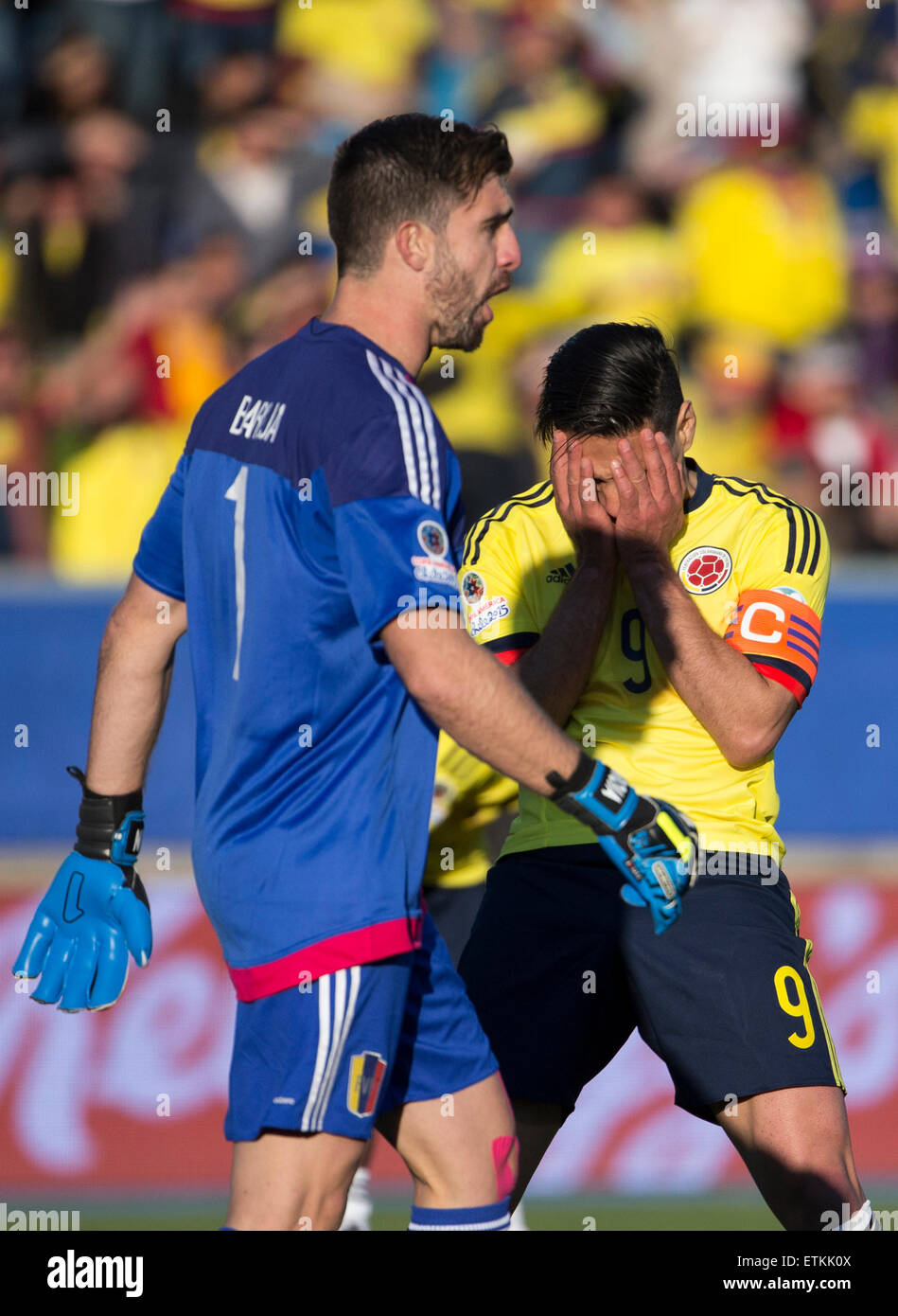 Rancagua, Chile. 14th June, 2015. Colombia's Radamel Falcao (R) reacts during a Group C match between Colombia and Venezuela at Copa America 2015 in Rancagua, Chile, June 14, 2015. Colombia lost the match 0-1. Credit:  Guillermo Arias/Xinhua/Alamy Live News Stock Photo