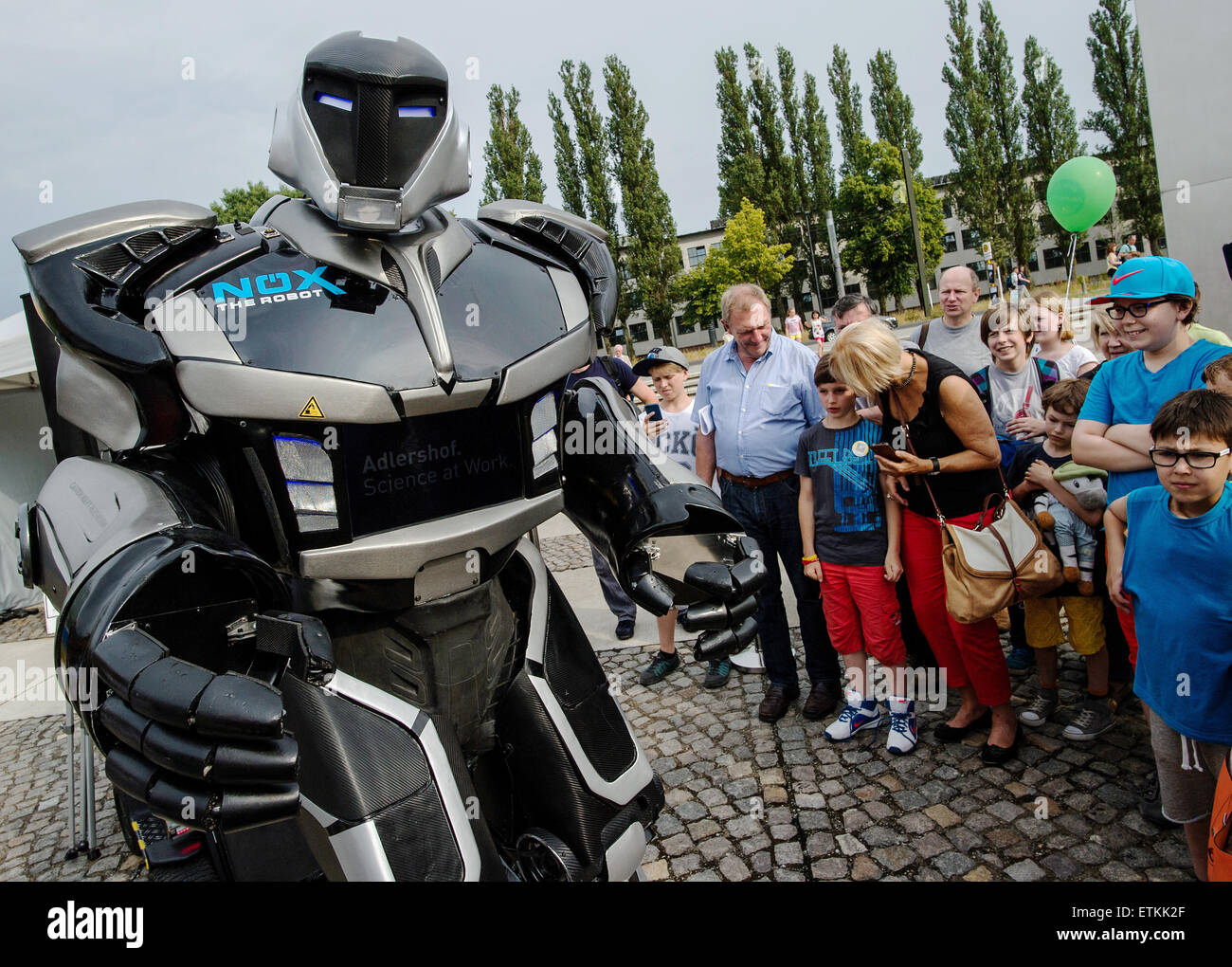 Berlin, Germany. 13th June, 2015. 'NOX the Robot' welcomes visitors to the  Long NIght of the