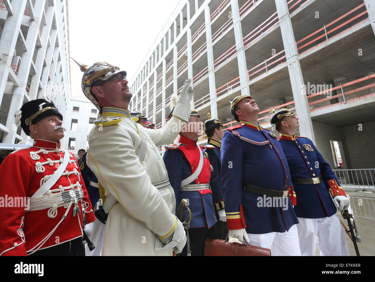 Berlin, Germany. 14th June, 2015. Members of a club wear uniforms of the former Prussian army as they visit the construction site of the Berlin City Palace in Berlin, Germany, 14 June 2015. The site was open to the public during the 'Open Construction Site Day' for two days. PHOTO: STEPHANIE PILICK/dpa/Alamy Live News Stock Photo