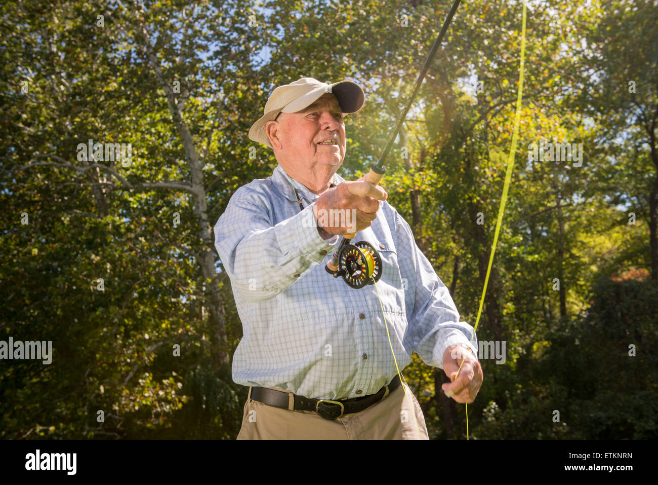 Lefty Kreh, American fly fisherman demonstrating his casting techniques in Timonium, Maryland, USA Stock Photo