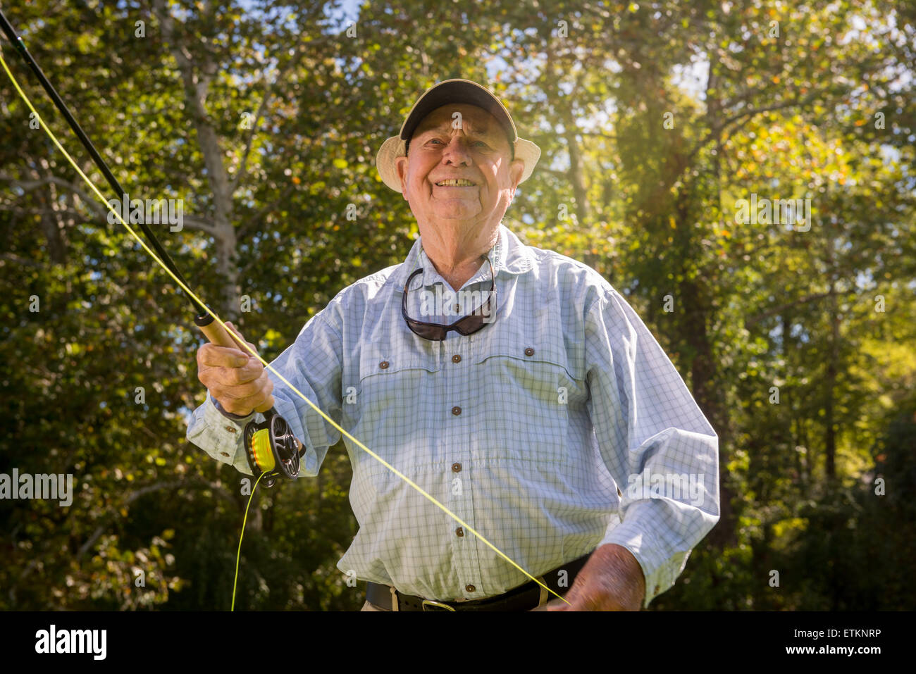 Lefty Kreh, American fly fisherman demonstrating his casting techniques in Timonium, Maryland, USA Stock Photo