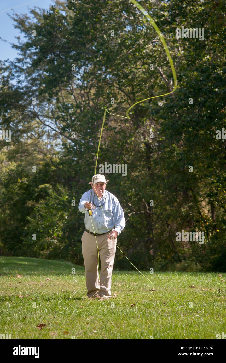 Lefty Kreh, American fly fisherman demonstrating his casting techniques in Timonium, Maryland, USA Stock Photo