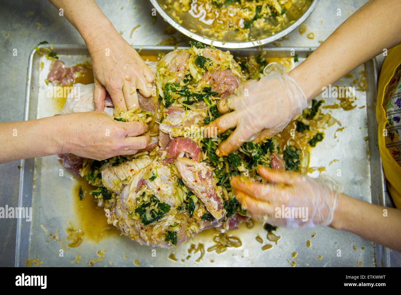 People stuffing hams in St Mary's County Maryland, USA Stock Photo Alamy