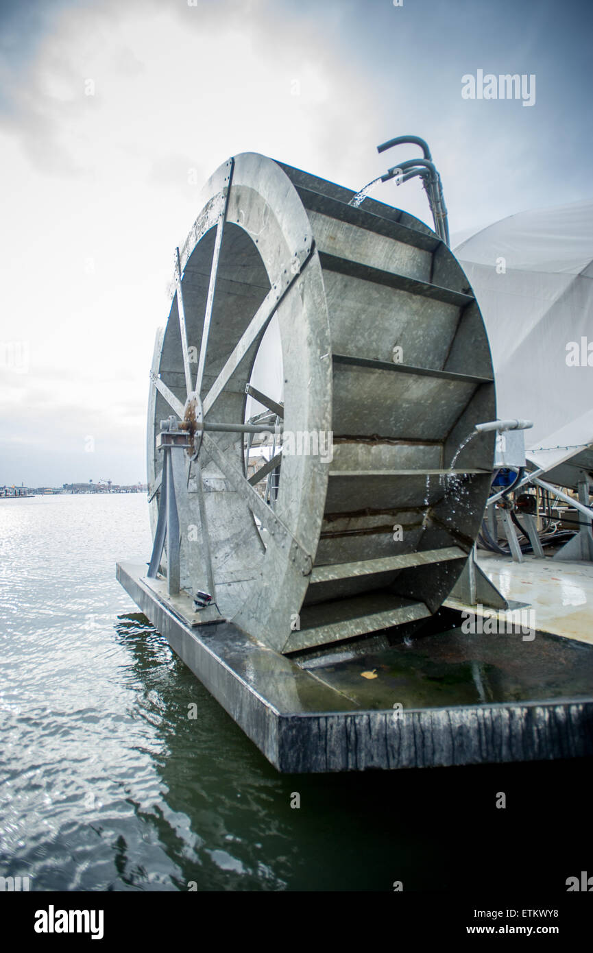 Solar Powered Water Wheel Trash Interceptor in Baltimore Harbor, Maryland, USA, invented by John Kellet. Stock Photo