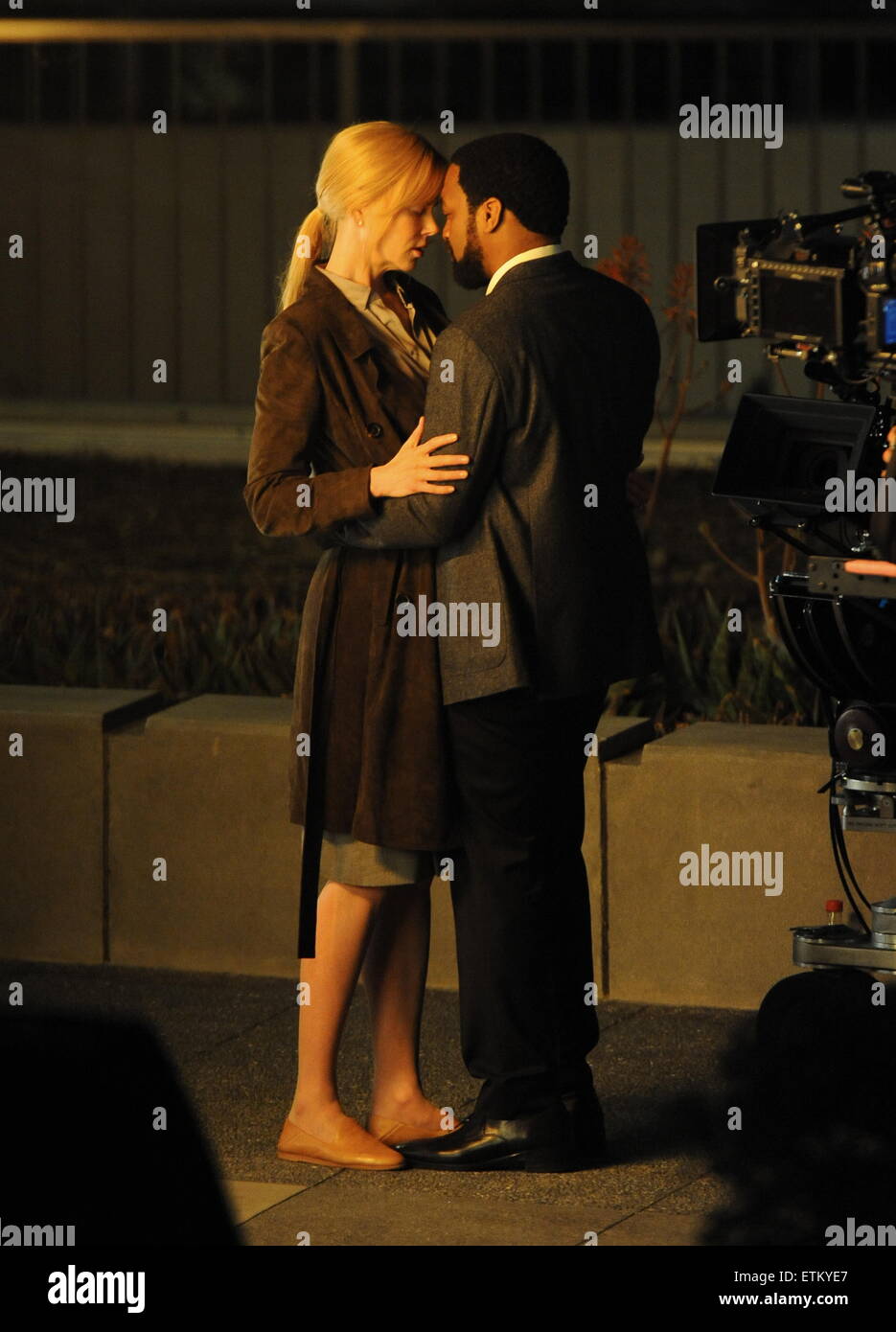 Actress Nicole Kidman filming late night scenes for 'The Secret In their Eyes' with co star Chiwetel Ejiofor in downtown Los Angeles. The couple gets emotional after witnessing a car reck and starts kissing in the middle of the street.  Featuring: Nicole Kidman, Chiwetel Ejiofor Where: Los Angeles, California, United States When: 10 Mar 2015 Credit: Cousart/JFXimages/WENN.com Stock Photo