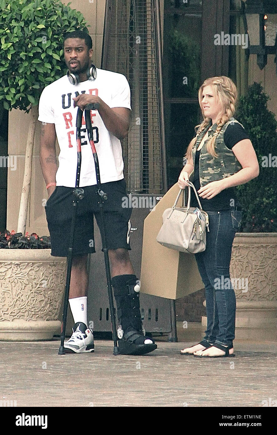 Basketball player Wesley Matthews leaves a hotel in Beverly Hills with