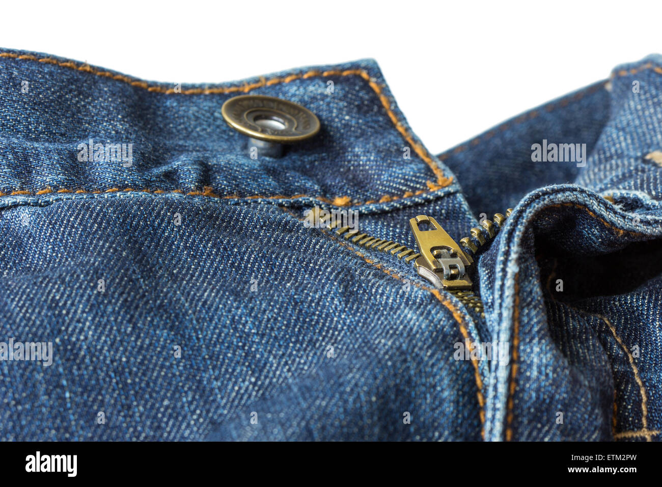 Closeup of open, unzipped and unbuttoned blue denim jeans isolated on