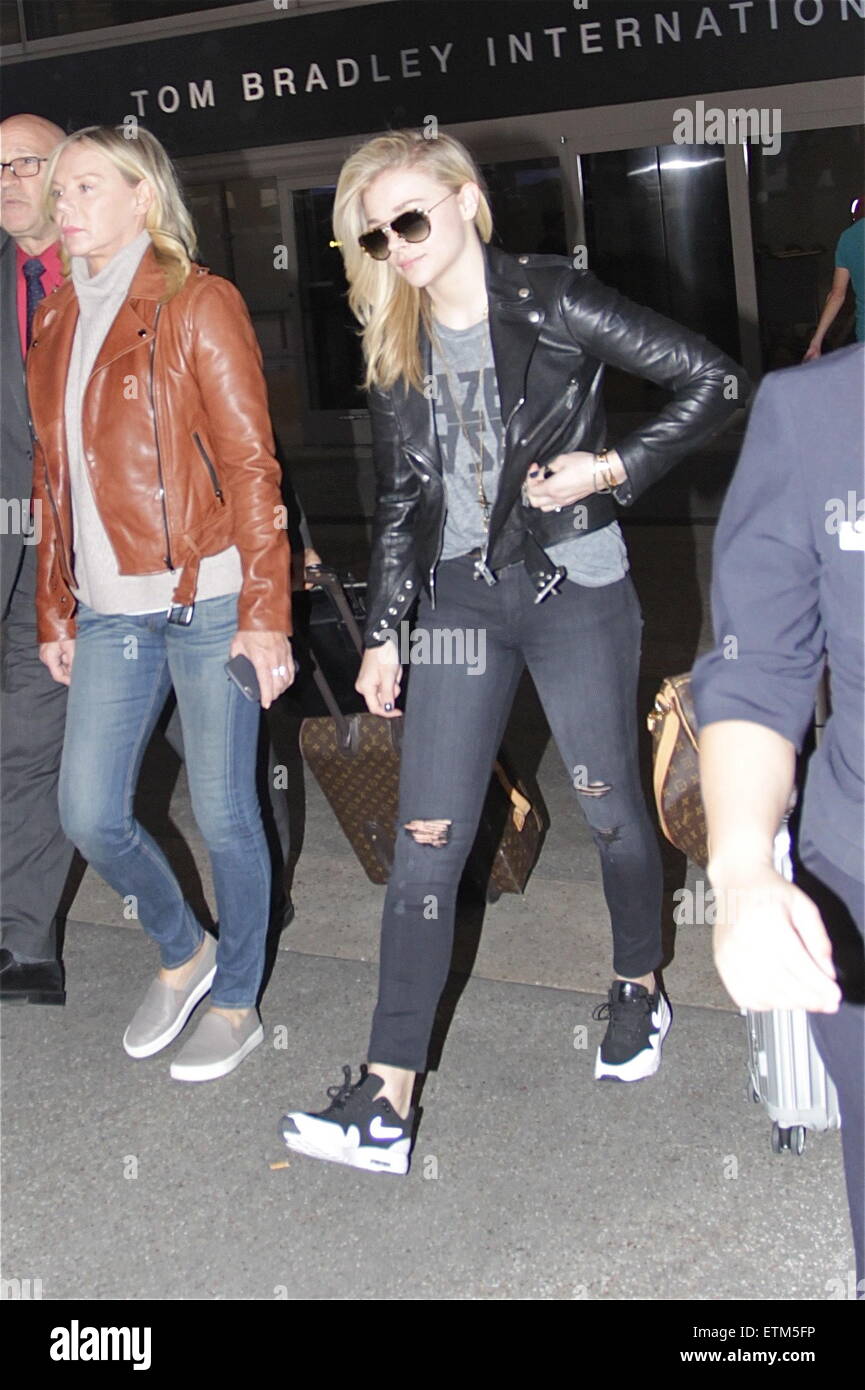 Chloe Grace Moretz with her brother and mother arrive at Los Angeles