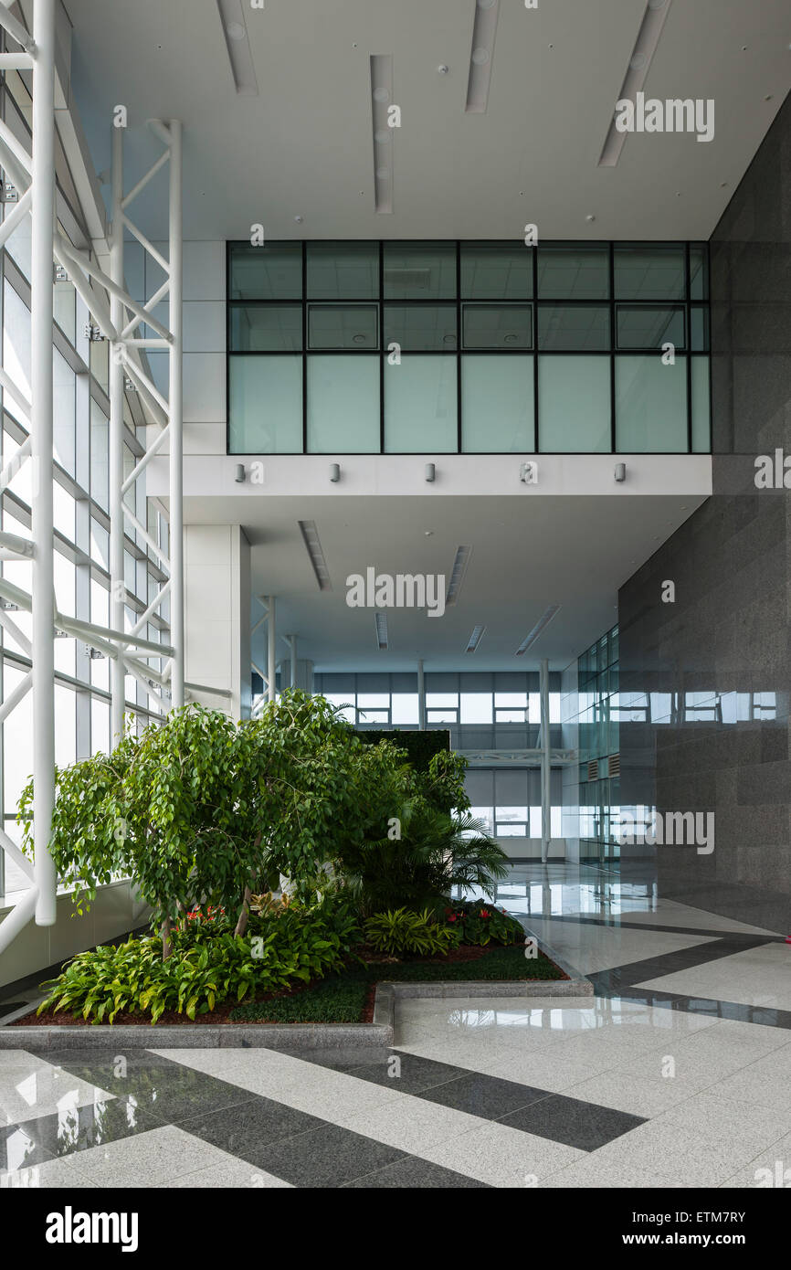 Usage of stone and glazing in foyer. G-Tower in Incheon, Incheon, Korea, South. Architect: HAEAHN Architecture, 2013. Stock Photo