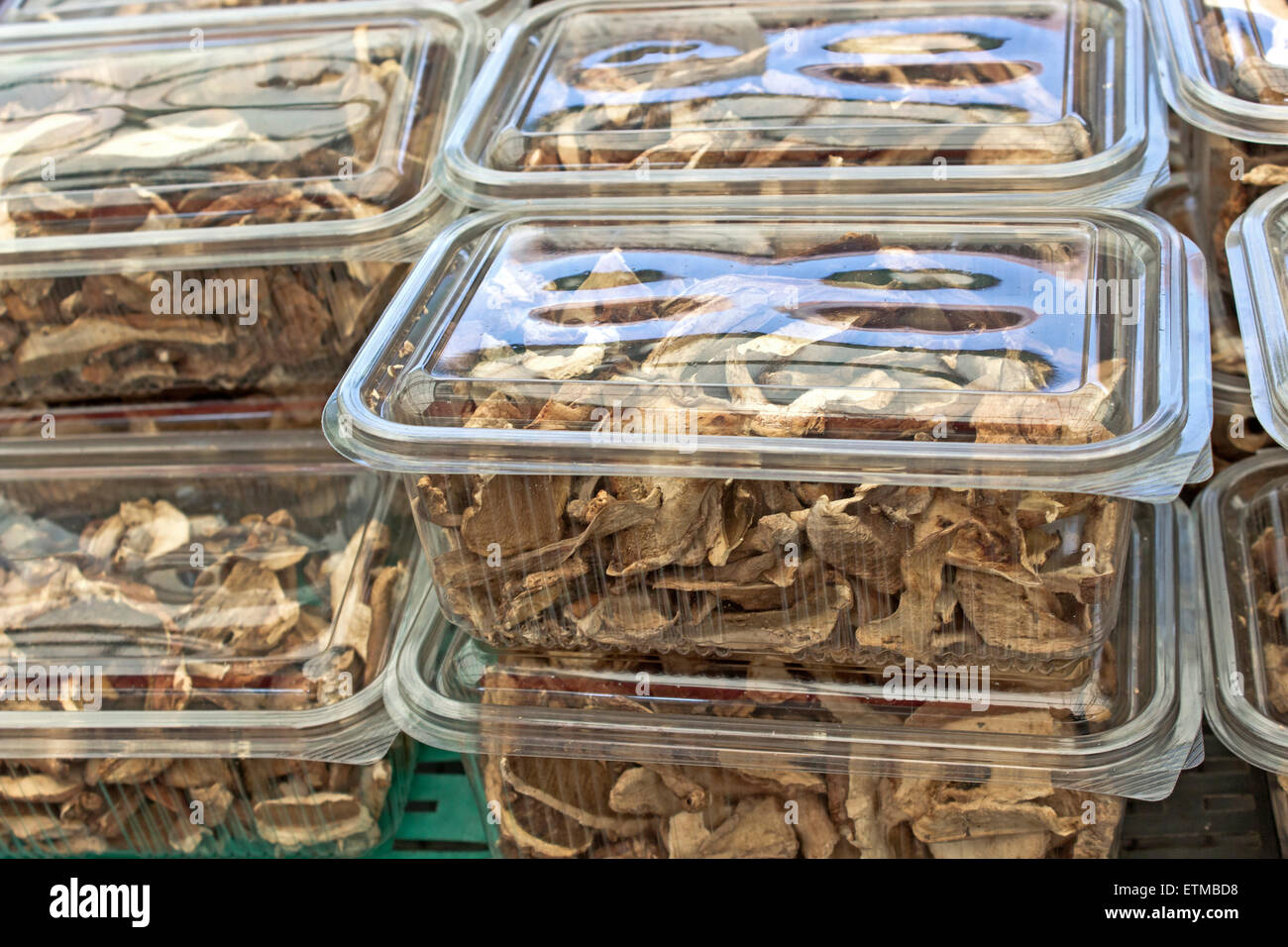 Dried porcino mushrooms in plastic box - boletus edulis Stock Photo