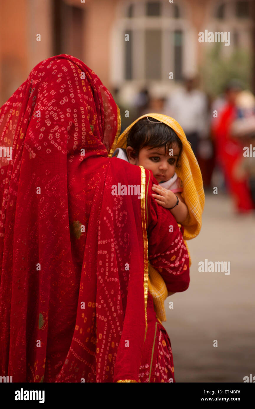 Indian woman carrying baby hi-res stock photography and images - Alamy