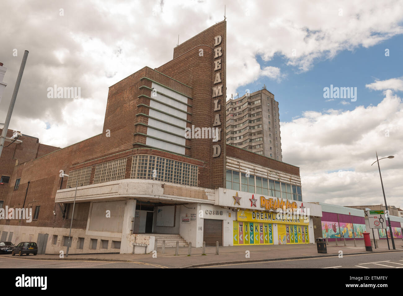 Old Dreamland Margate June 2015 amusement park entrance sign dominating the seafront with towerblocks behind Stock Photo