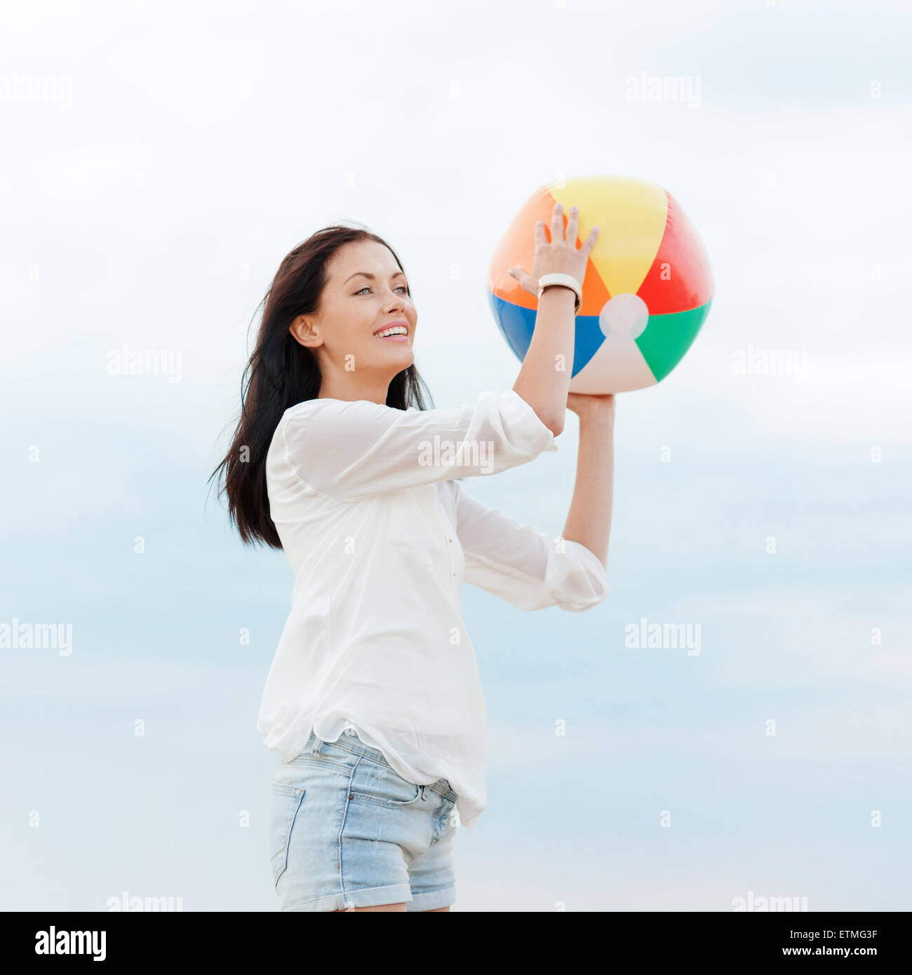 girl with ball on the beach Stock Photo - Alamy