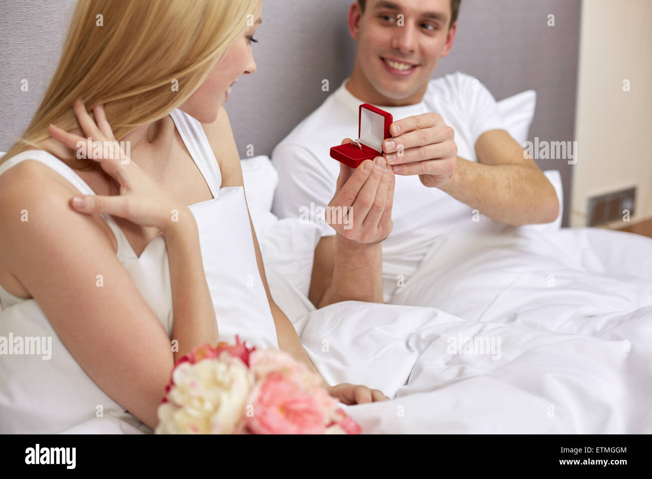 close up of man giving woman engagement ring Stock Photo