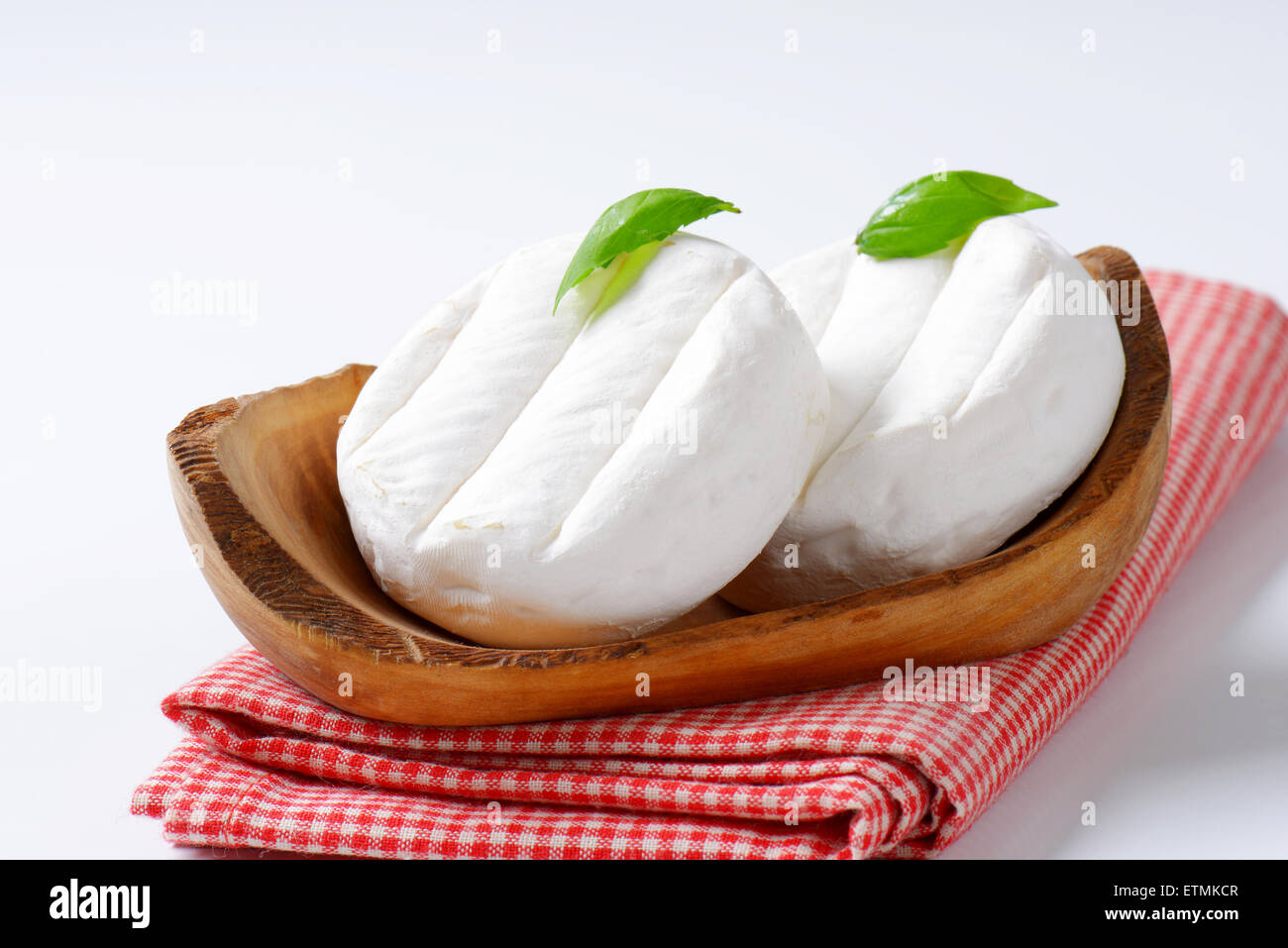 two wheels of soft creamy cheese with white mold Stock Photo