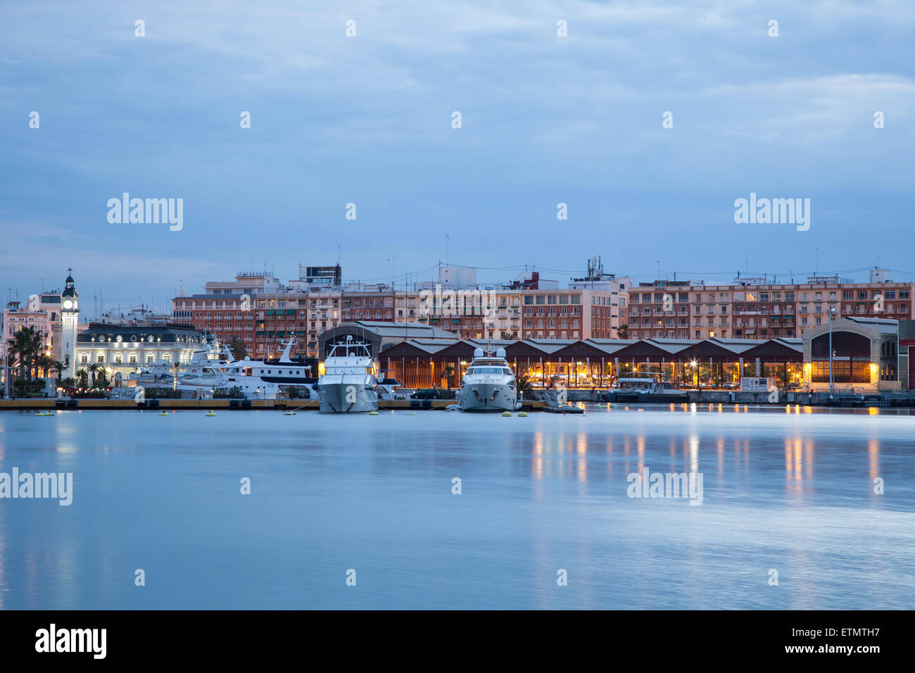 Americas Cup port in Valencia illuminated at dusk, Spain Stock Photo