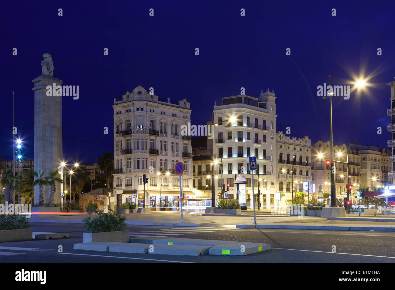 City street Avinguda de Manuel Soto illuminated at night in Valencia, Spain Stock Photo