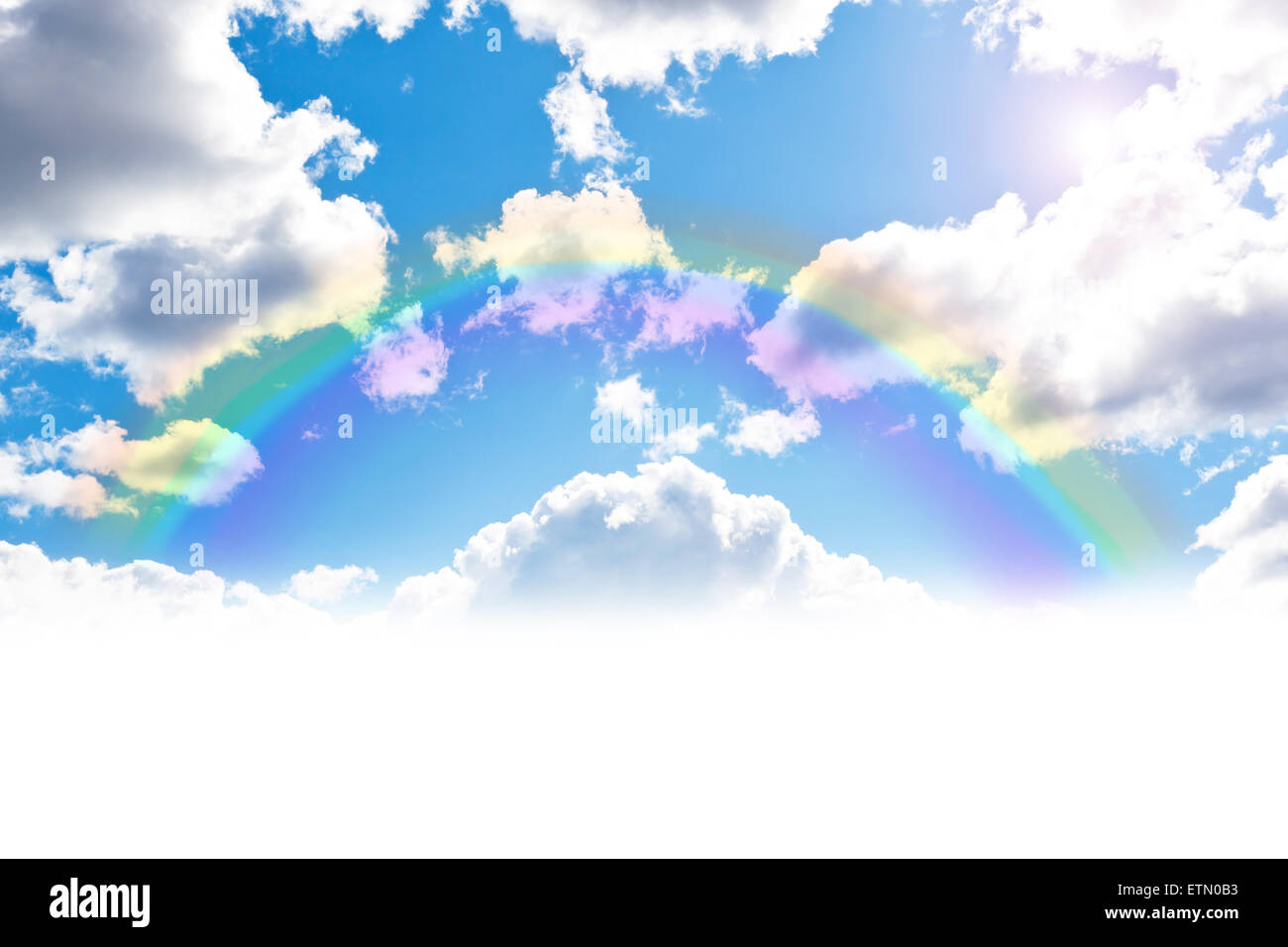 Blue cloudly sky with rainbow background and free space for your text Stock Photo
