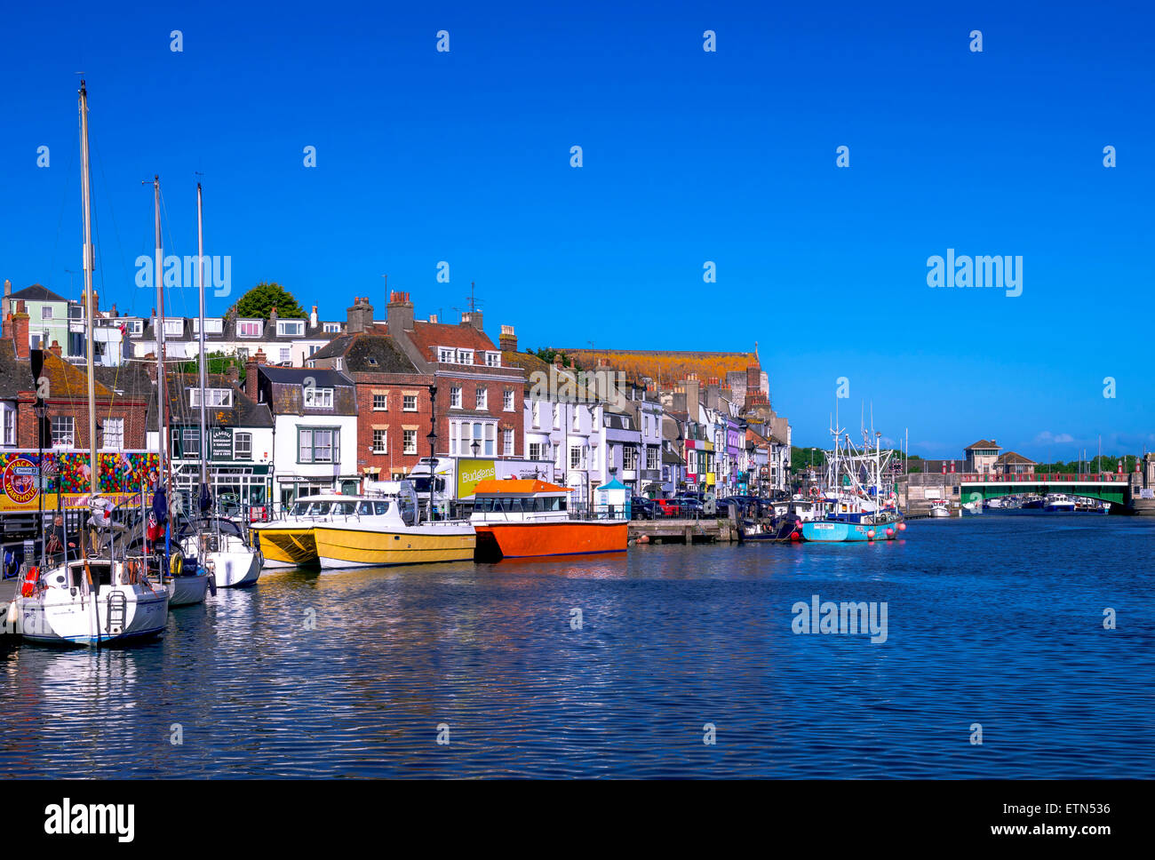 Boats and yachts moored in Weymouth harbour. Stock Photo