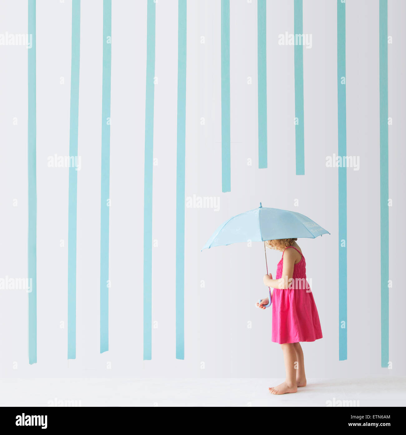 Girl standing in rain hires stock photography and images Alamy