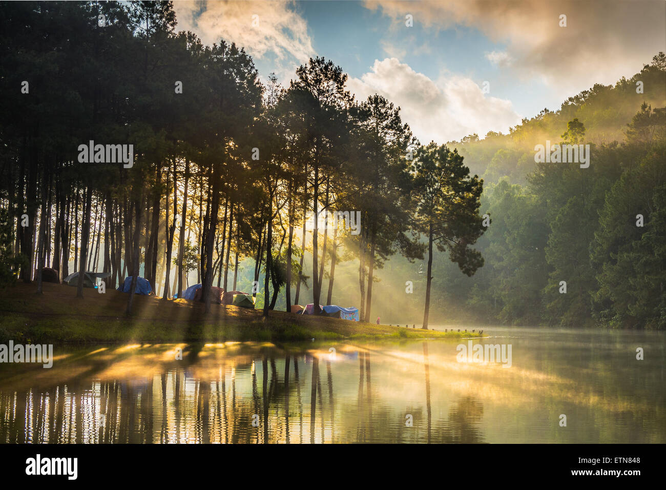 Tents on a treelined riverbank, Pang Ung, Thailand Stock Photo - Alamy