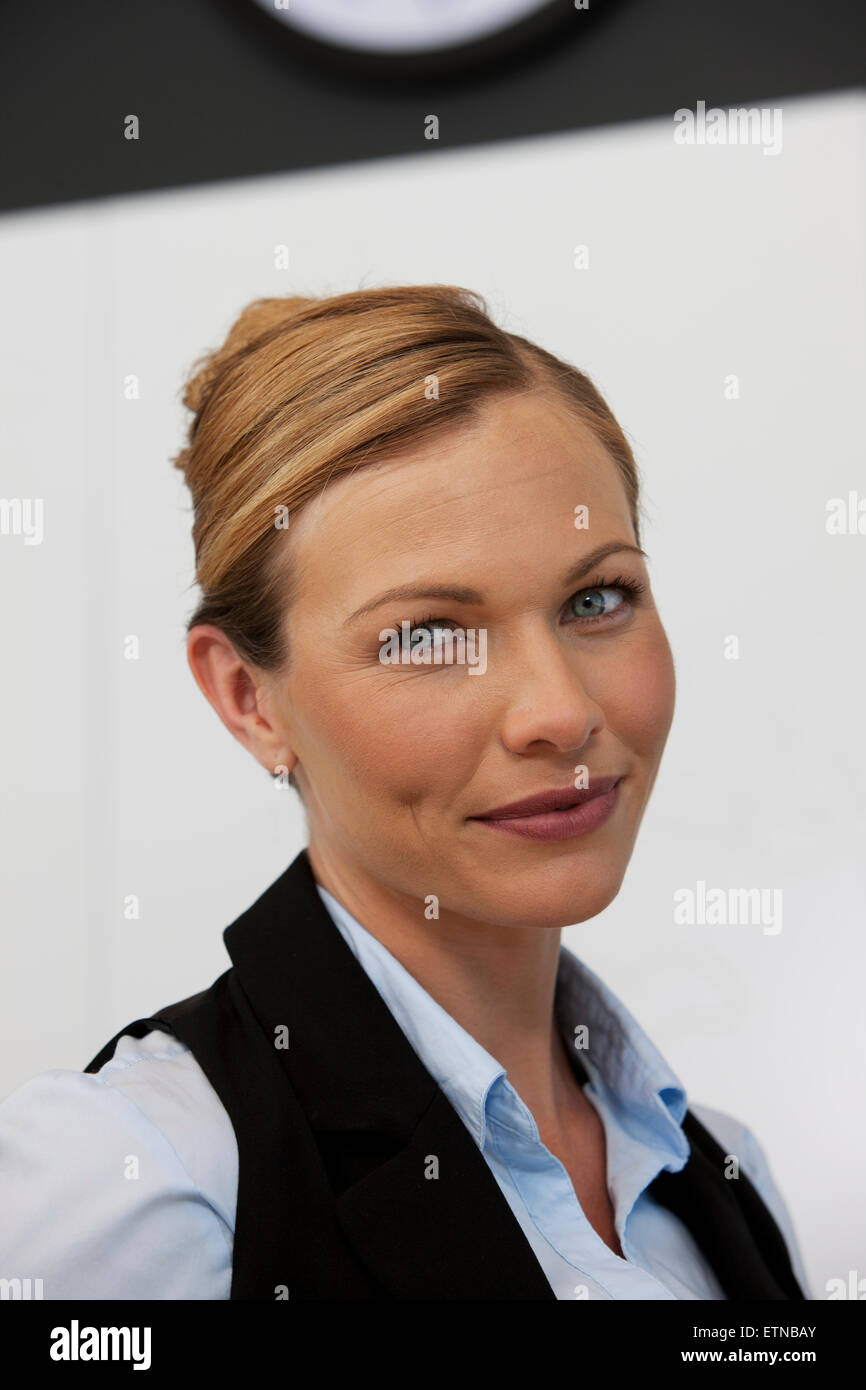Portrait of a smiling business woman Stock Photo - Alamy