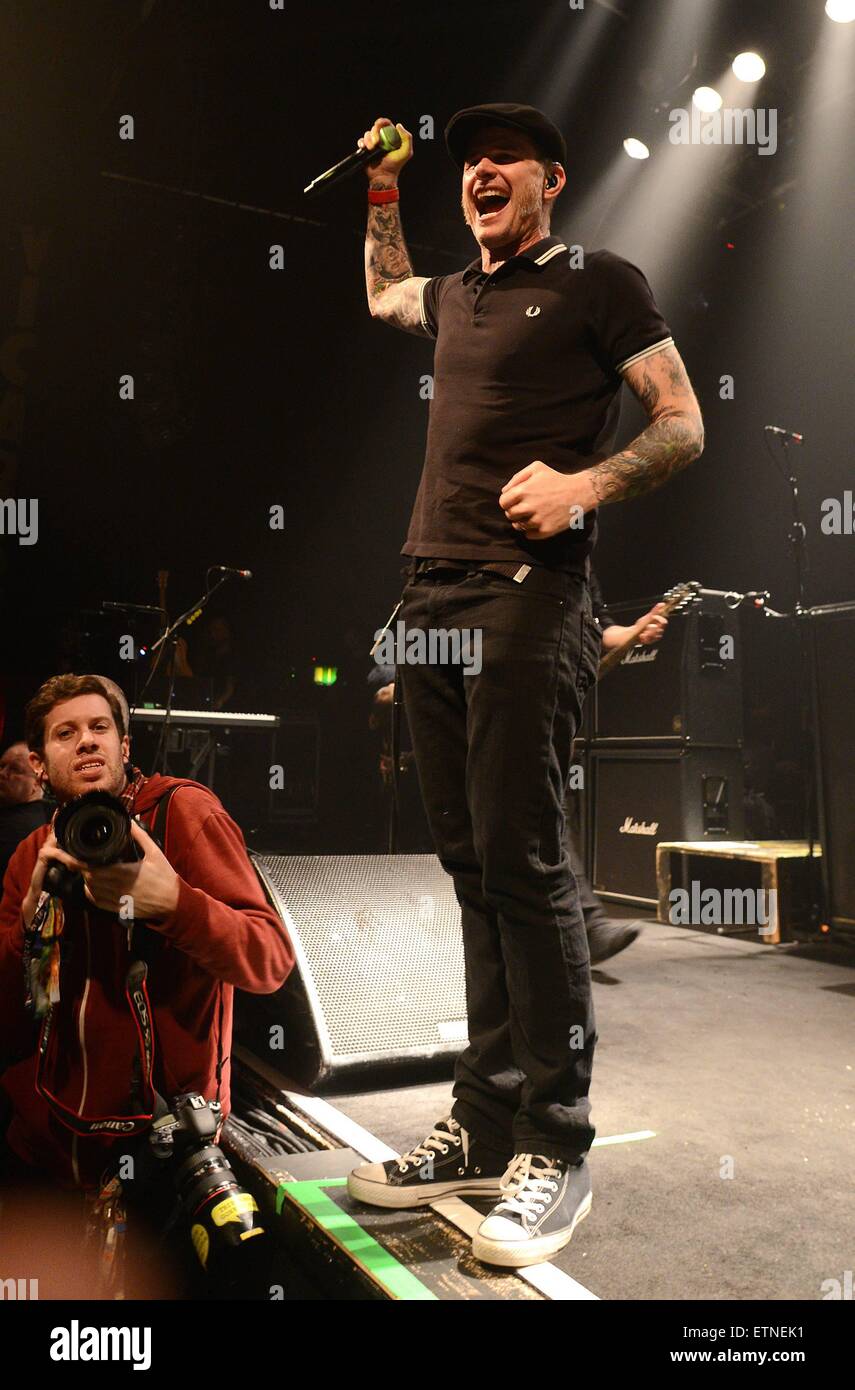 Singer Al Barr is shown performing onstage during a live concert  appearance with the Dropkick Murphys Stock Photo - Alamy