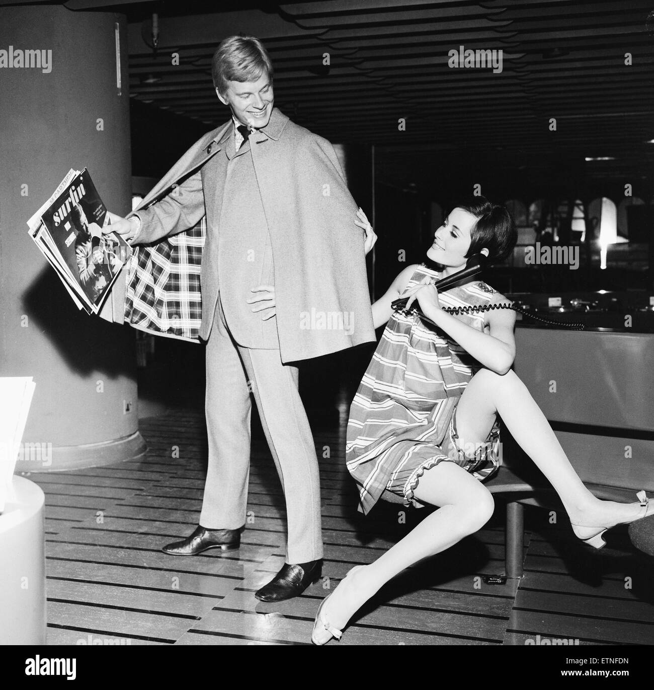 Way In the new unique 20,000 square foot boutique planned by Sir Hugh Fraser for the fourth floor of Harrods set to open on the 7th June 1967. Shop assistant Nigel Wood and Shoula Tevet modelling some of the range of clothing available at the boutique. 5th June 1967 Stock Photo