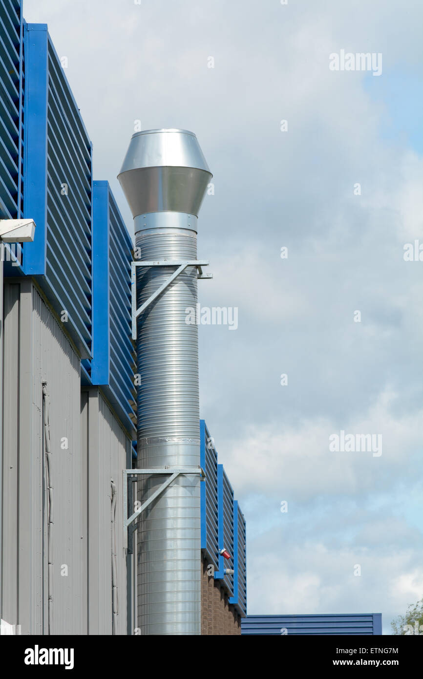 Industrial Unit with aluminum chimney Stock Photo