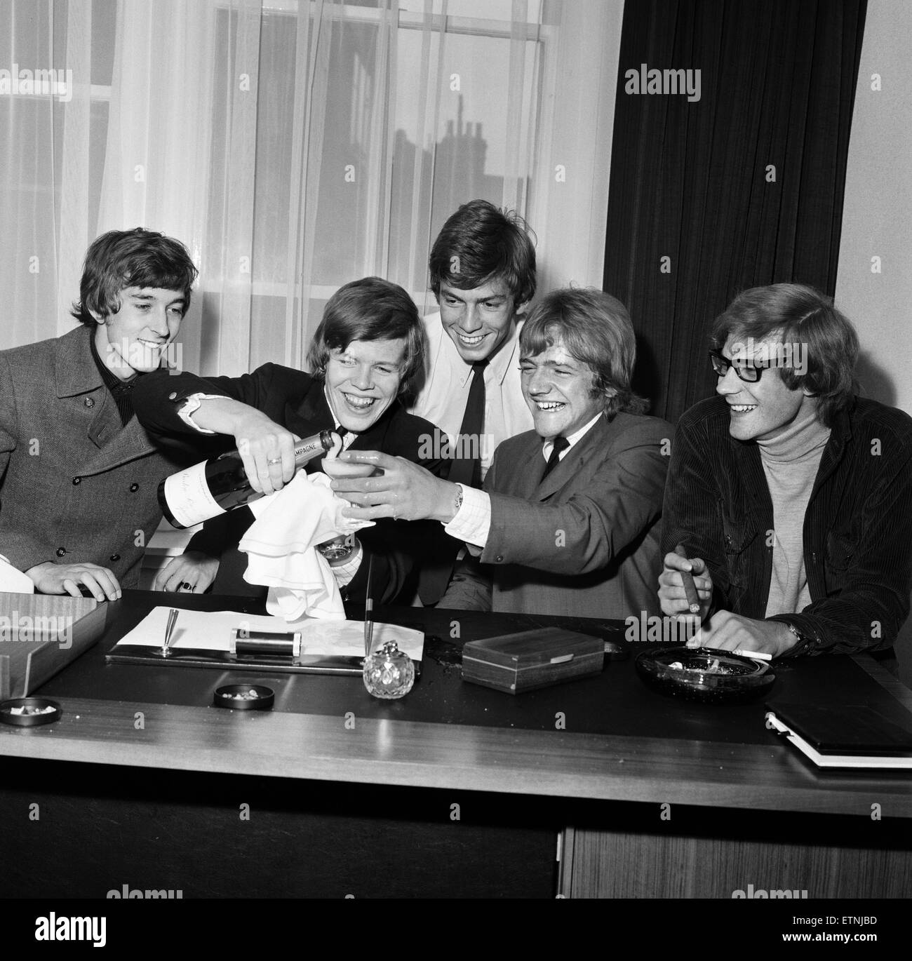 British pop group Herman Hermits, led by singer Peter Noone, pictured after the group were signed to a huge film and disc deal with Metro Goldwyn Meyer. The deal, in excess of one million dollars encompasses motion pictures and recordings. 15th March 1966. Stock Photo
