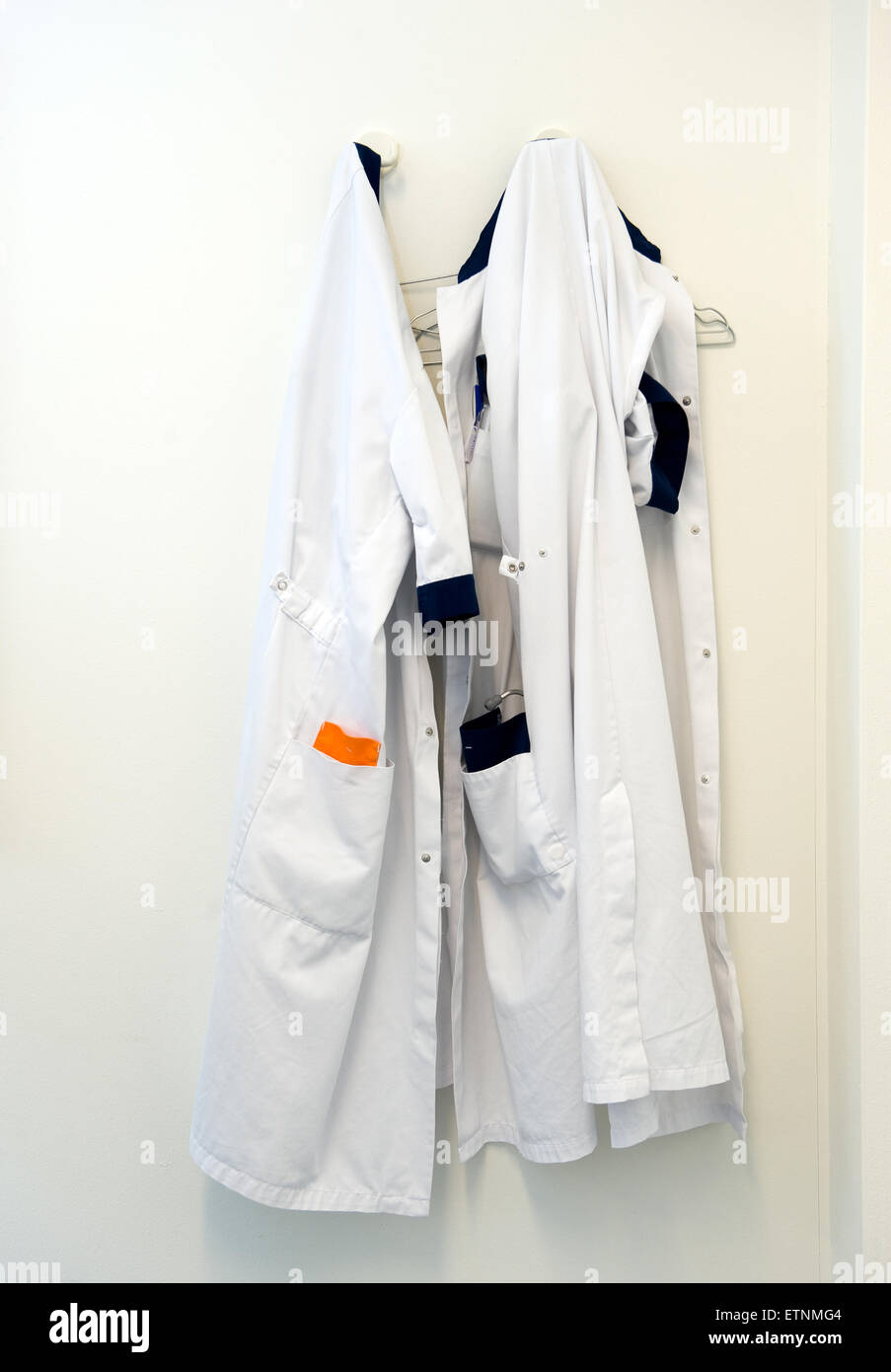 Lab coats hanging on hook hires stock photography and images Alamy