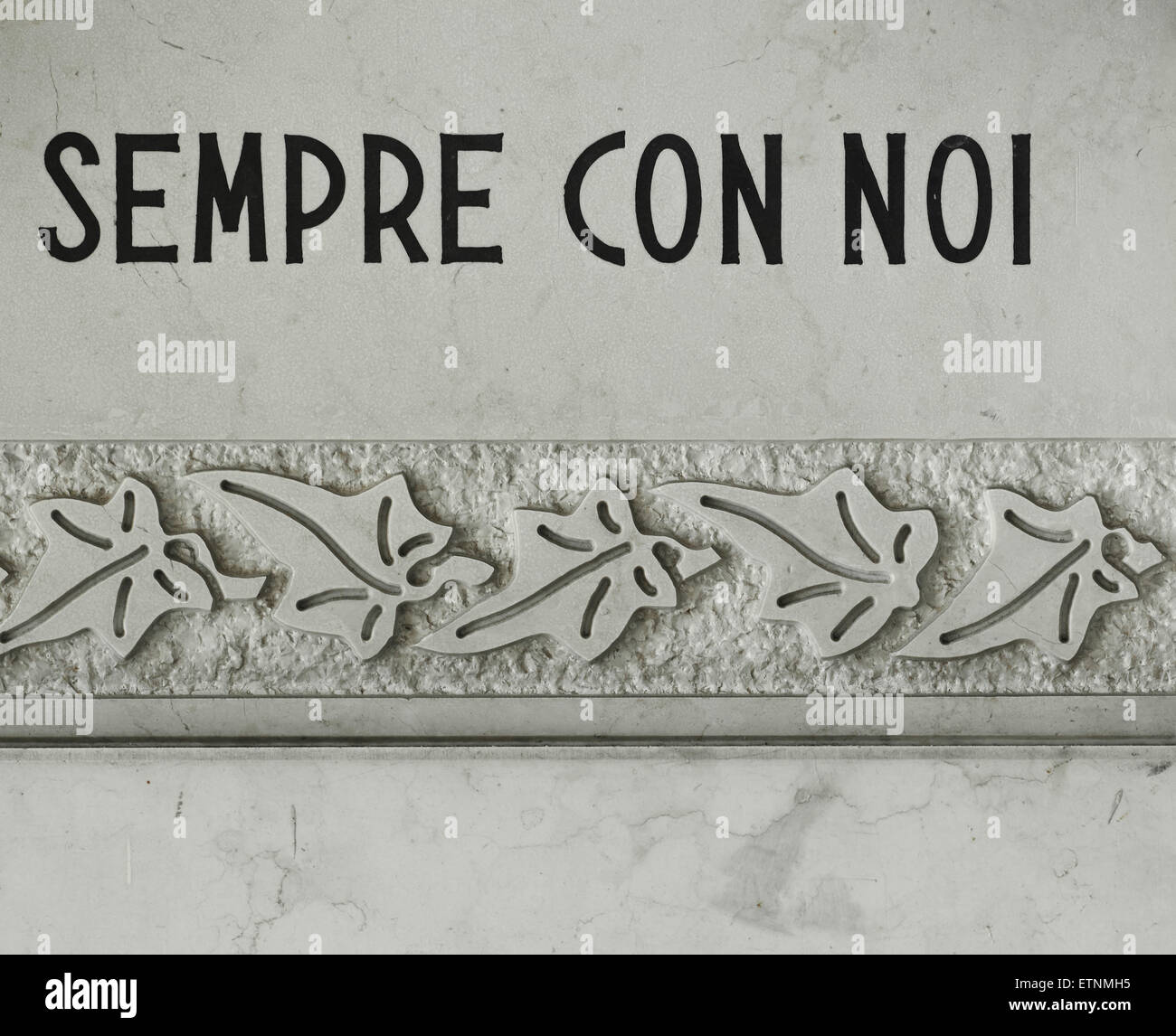 'Sempre Con Noi' - 'Always with us' carved on a tombstone on San Michele Island Venice Veneto Italy Europe Stock Photo