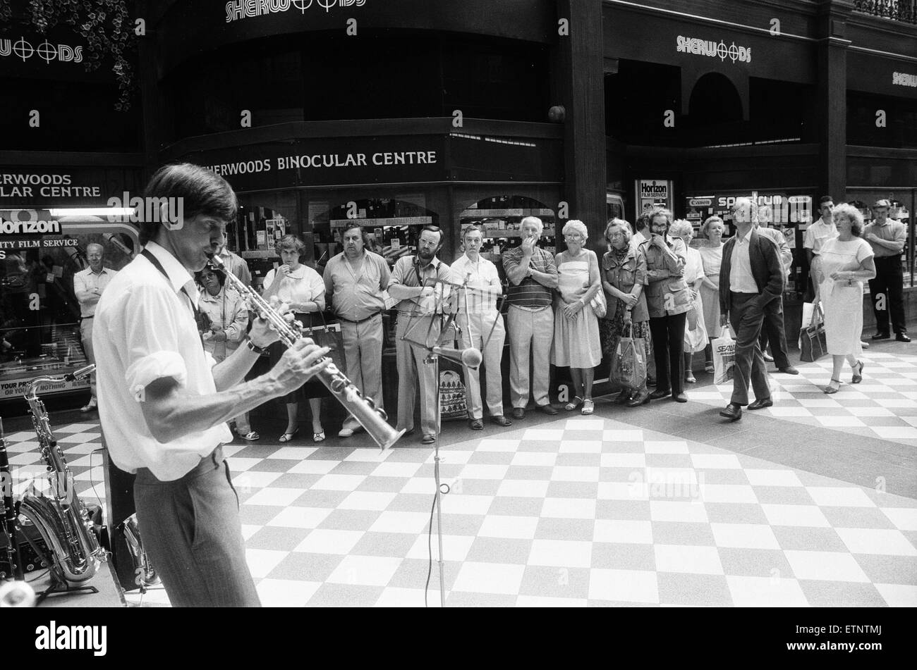 1987 Birmingham International Jazz and Blues Festival, Artists, 4th July 1987. Trevor Whiting with his Jazz Swingtet from London, play to shoppers in the Great Western Arcade in Birmingham City Centre. Stock Photo