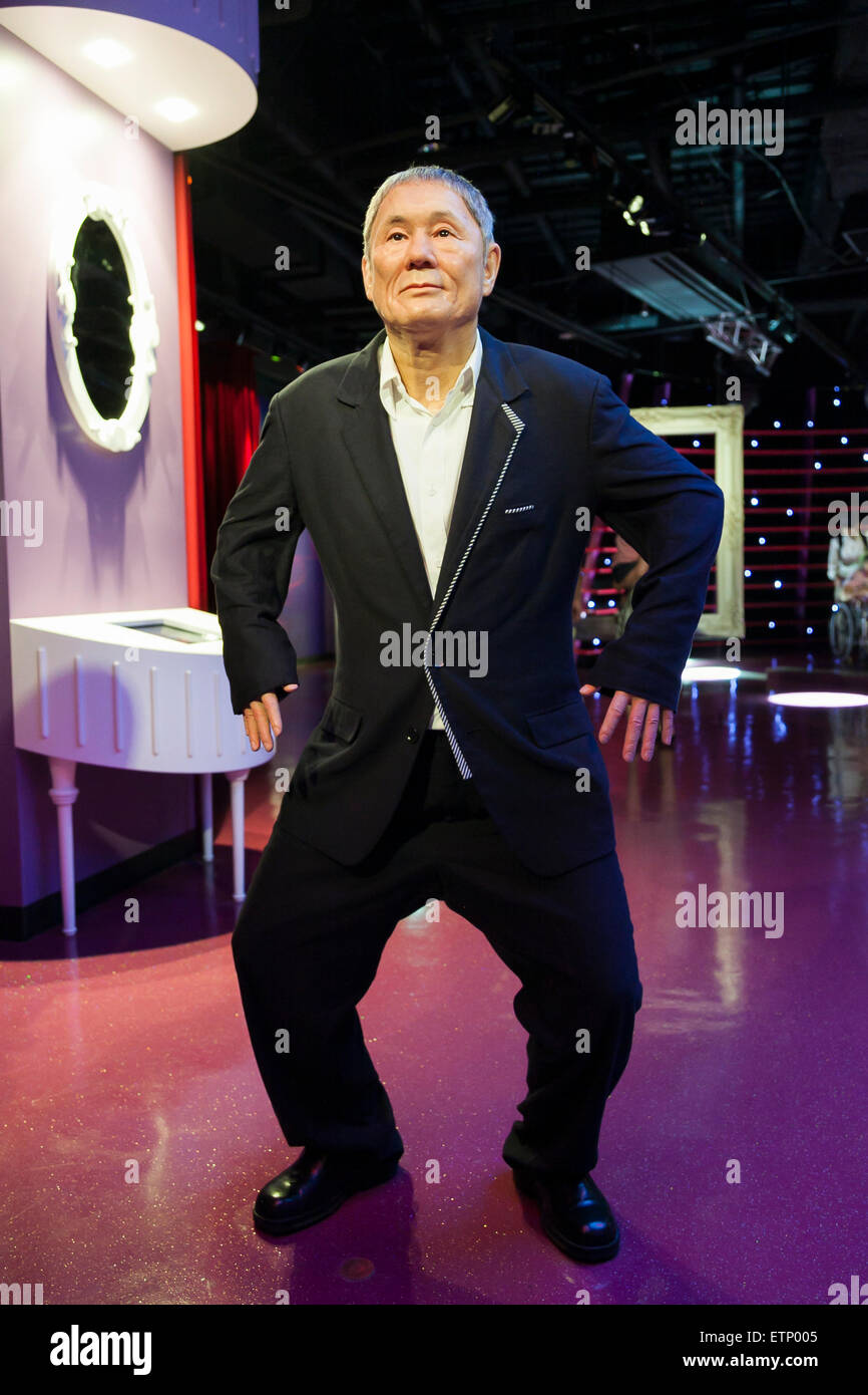A wax figure of Takeshi Kitano, Japanese, director, comedian, singer and actor on display at the Madame Tussauds Tokyo wax museum in Odaiba, Tokyo, June 15, 2015. The world famous British wax museum ''Madame Tussauds'' opened its 14th permanent branch in Tokyo in 2013 and exhibits international and local celebrities, sports players and politicians. New additions to the collection include wax figures of the Japanese figure skater Yuzuru Hanyu and the actor Benedict Cumberbatch. The wax figure of Benedict Cumberbatch will be exhibited until June 30th. (Photo by Rodrigo Reyes Marin/AFLO) Stock Photo