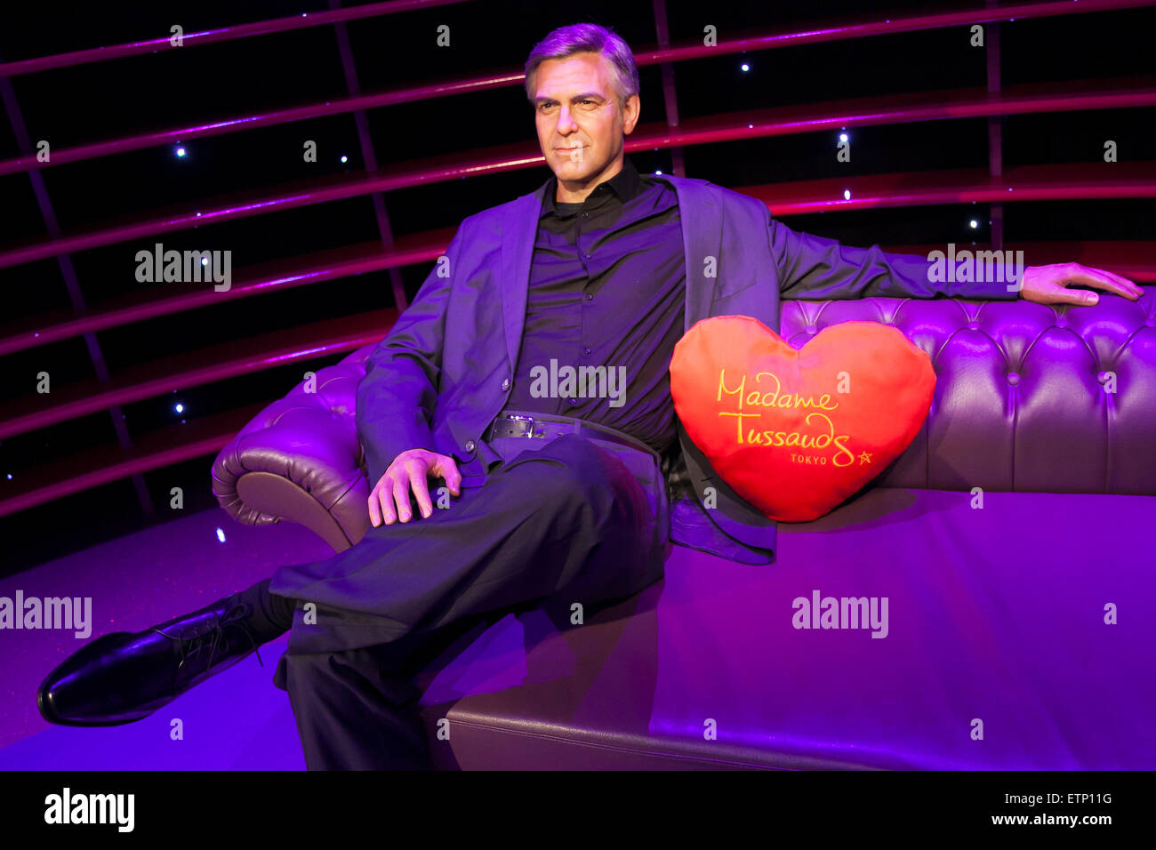 A wax figure of George Clooney, American actor, writer and producer on display at the Madame Tussauds Tokyo wax museum in Odaiba, Tokyo, June 15, 2015. The world famous British wax museum ''Madame Tussauds'' opened its 14th permanent branch in Tokyo in 2013 and exhibits international and local celebrities, sports players and politicians. New additions to the collection include wax figures of the Japanese figure skater Yuzuru Hanyu and the actor Benedict Cumberbatch. The wax figure of Benedict Cumberbatch will be exhibited until June 30th. (Photo by Rodrigo Reyes Marin/AFLO) Stock Photo